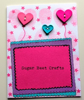 Buttons! Construction paper and stamps.